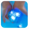 COOKIE MONSTER GLO PALS , 4 KOSTKI sensoryczne świecące w wodzie ULICA SEZAMKOWA - zabawka kąpielowa